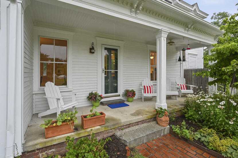 69 Doane Road Harwich Port, MA 02646 - Photo 2 of 38 front view of a house with outdoor seating