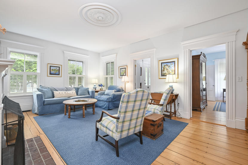 69 Doane Road Harwich Port, MA 02646 - Photo 5 of 38 a living room with furniture and wooden floor