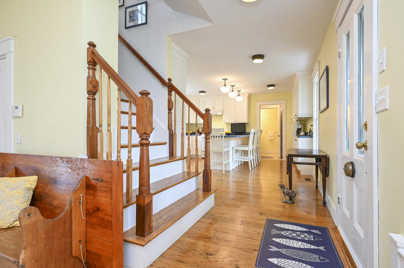 69 Doane Road Harwich Port, MA 02646 - Photo 8 of 38 a view of an entryway with wooden floor and a rug
