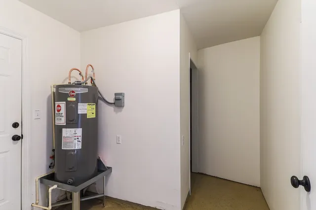 a room with a table and a mirror