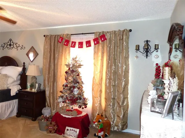 a bathroom with a sink mirror vanity and toilet
