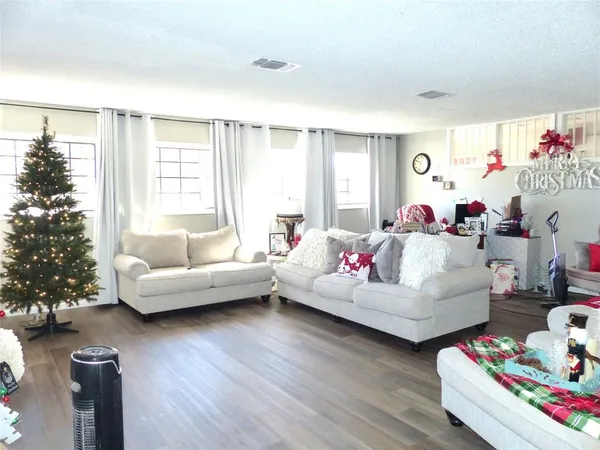 a living room with furniture and a couch