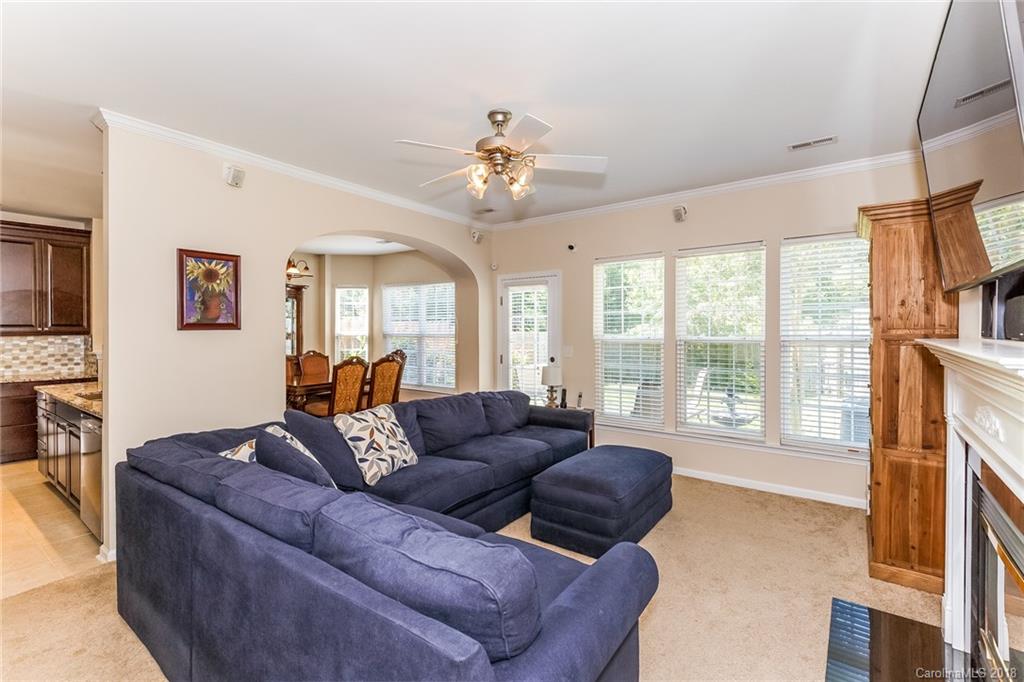 3900 Caliper Place Fort Mill, SC 29708 - Photo 3 of 27 a living room with furniture and a large window
