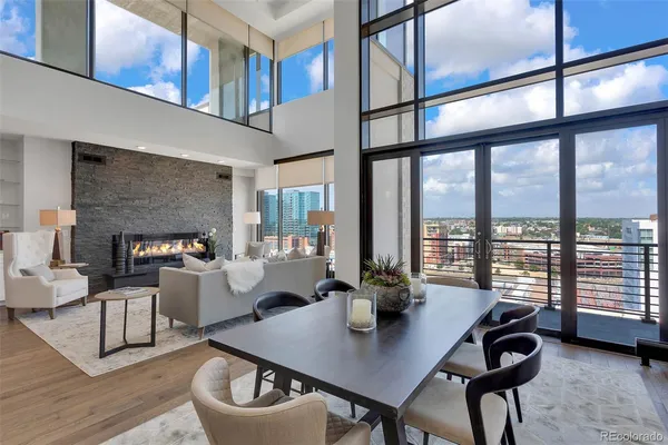 a kitchen with counter top space a sink a stove and cabinets