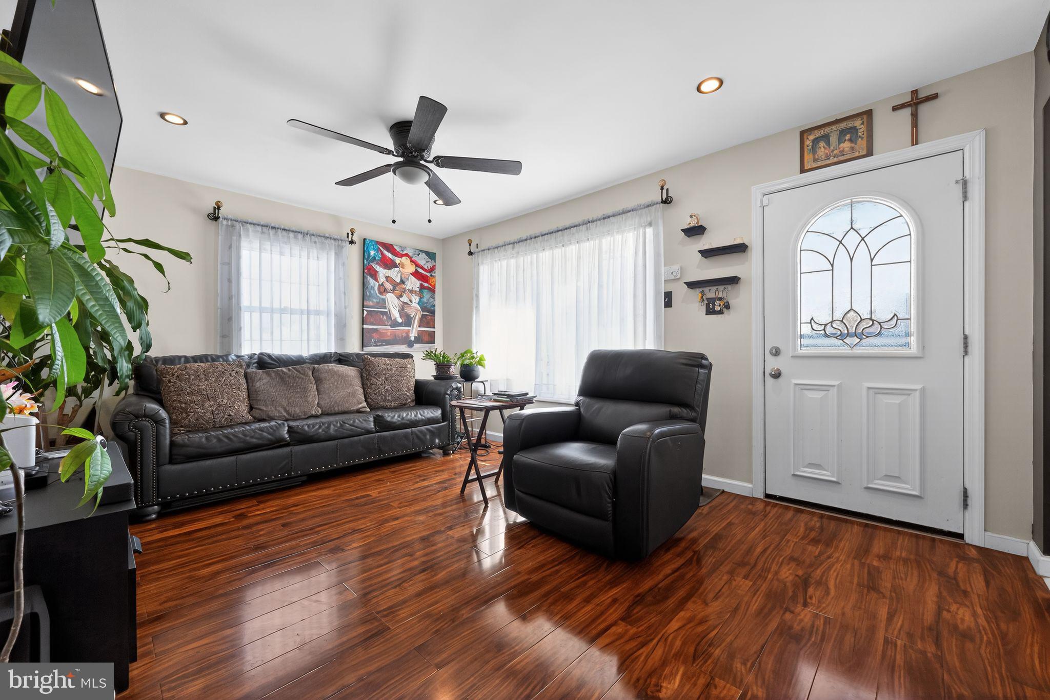 2021 South Brighton Avenue Clementon, NJ 08021 - Photo 2 of 14 a living room with furniture and a wooden floor