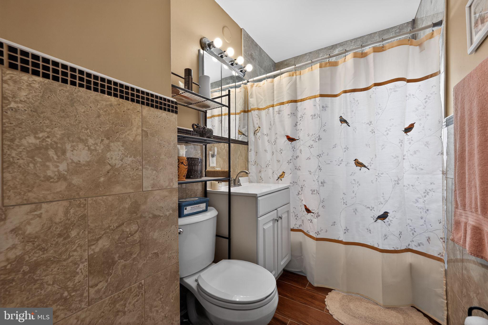 2021 South Brighton Avenue Clementon, NJ 08021 - Photo 7 of 14 a bathroom with a toilet and a shower