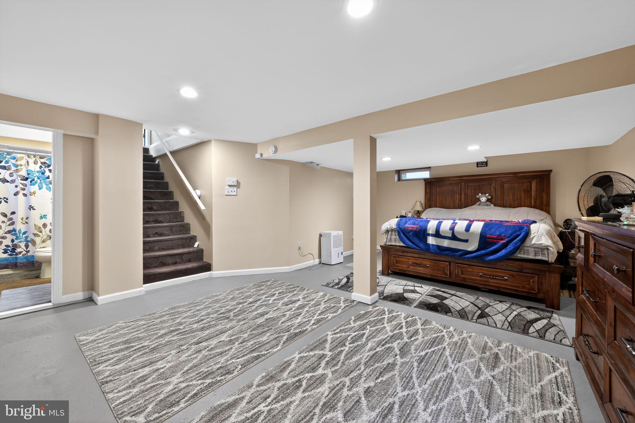 2021 South Brighton Avenue Clementon, NJ 08021 - Photo 10 of 14 a bedroom with furniture and a window