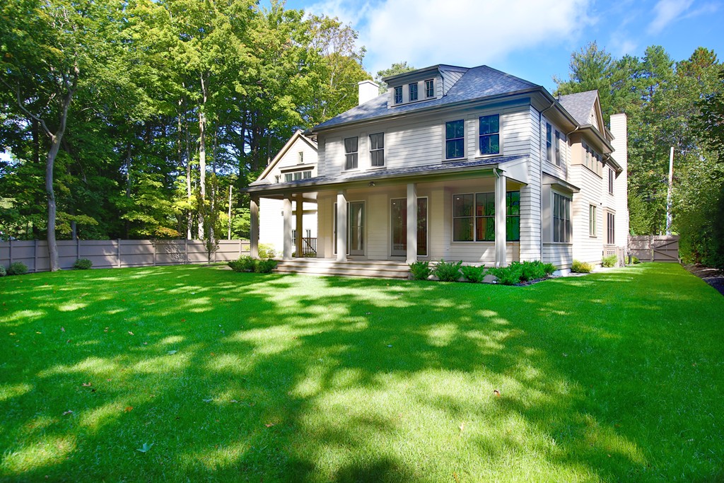 135 Neshobe Road Newton, MA 02468 - Photo 15 of 15 a front view of a house with yard and green space
