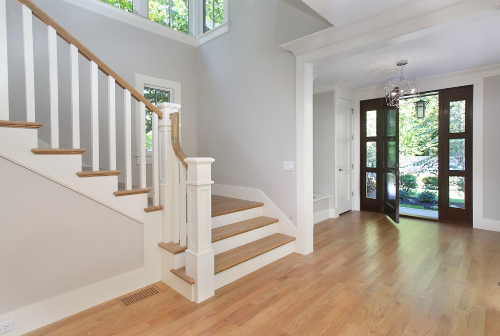 135 Neshobe Road Newton, MA 02468 - Photo 5 of 15 a view of an entryway with wooden floor and door