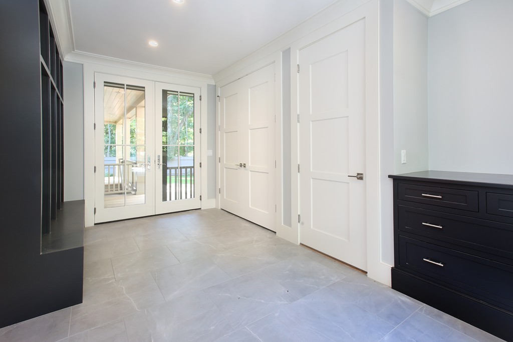 135 Neshobe Road Newton, MA 02468 - Photo 9 of 15 a view of an empty room with a window