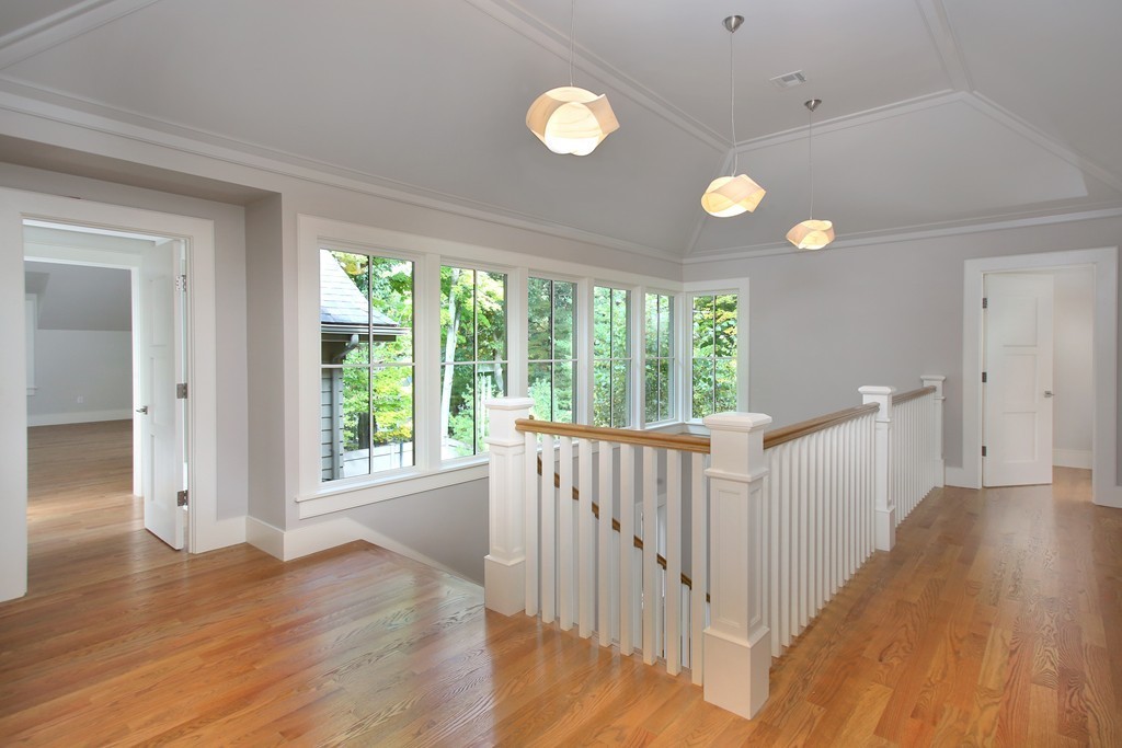 135 Neshobe Road Newton, MA 02468 - Photo 10 of 15 a view of a room with wooden floor and windows