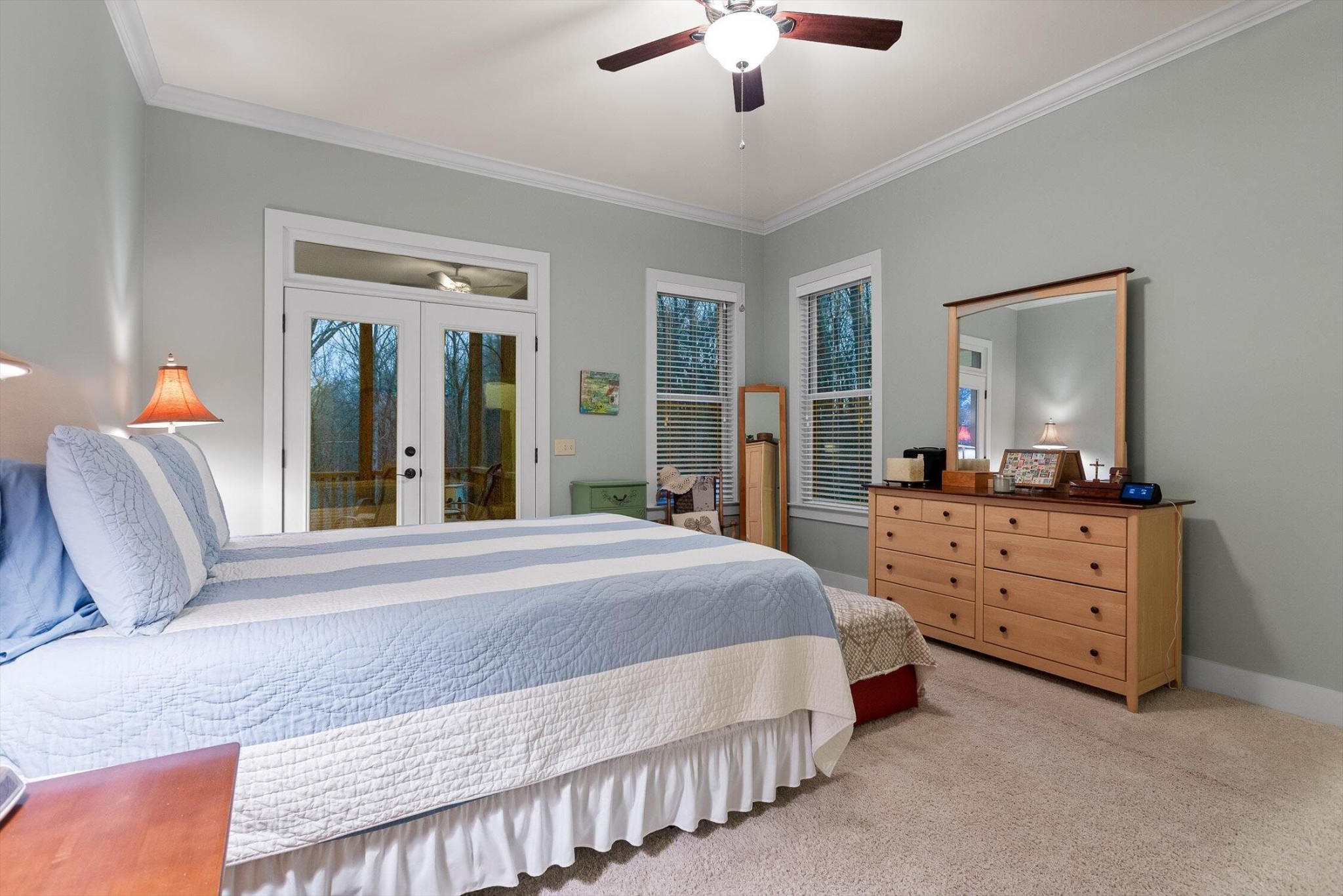 116 Twilight Trail Dunlap, TN 37327 - Photo 33 of 80 a bedroom with a large bed and a chandelier