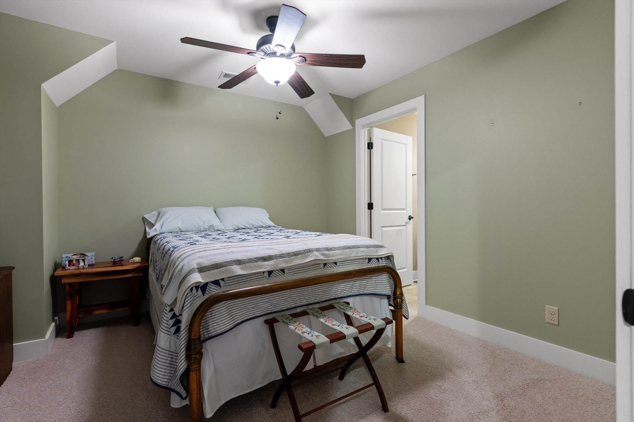 116 Twilight Trail Dunlap, TN 37327 - Photo 45 of 80 a bedroom with a bed and a chandelier