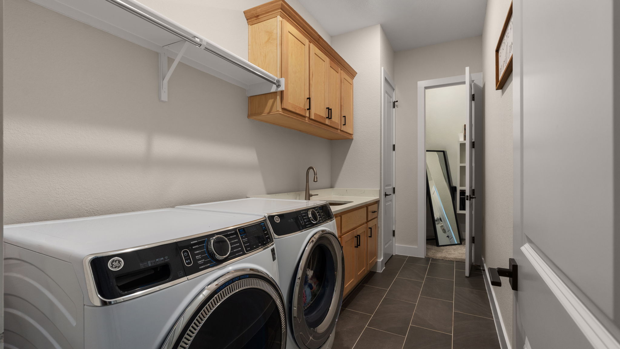 645 Two Creeks Lane Austin, TX 78737 - Photo 14 of 37 a utility room with dryer and washer