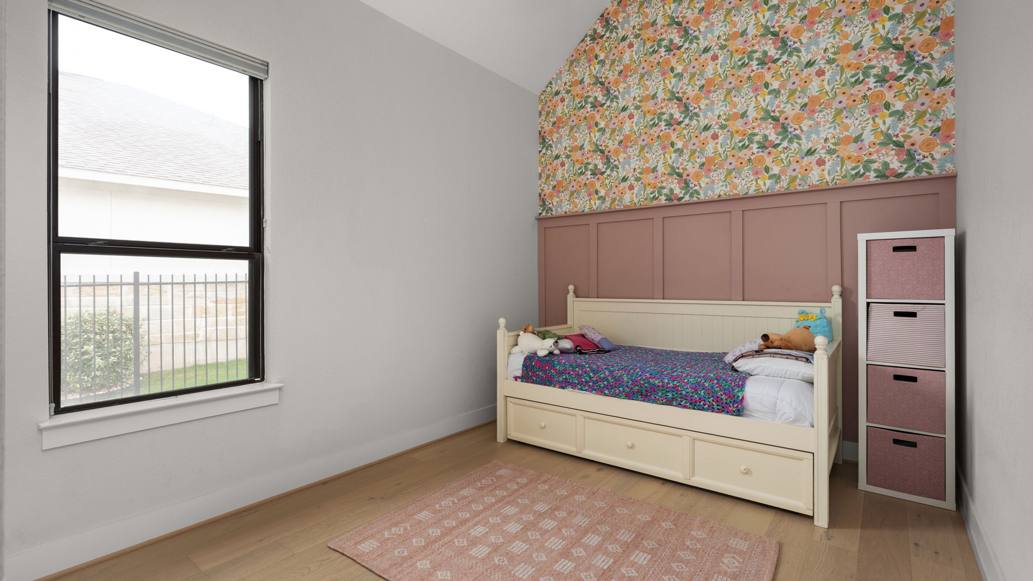 645 Two Creeks Lane Austin, TX 78737 - Photo 17 of 37 a room with painting on the wall and a window