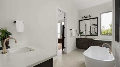 a bathroom with a sink and a bathtub