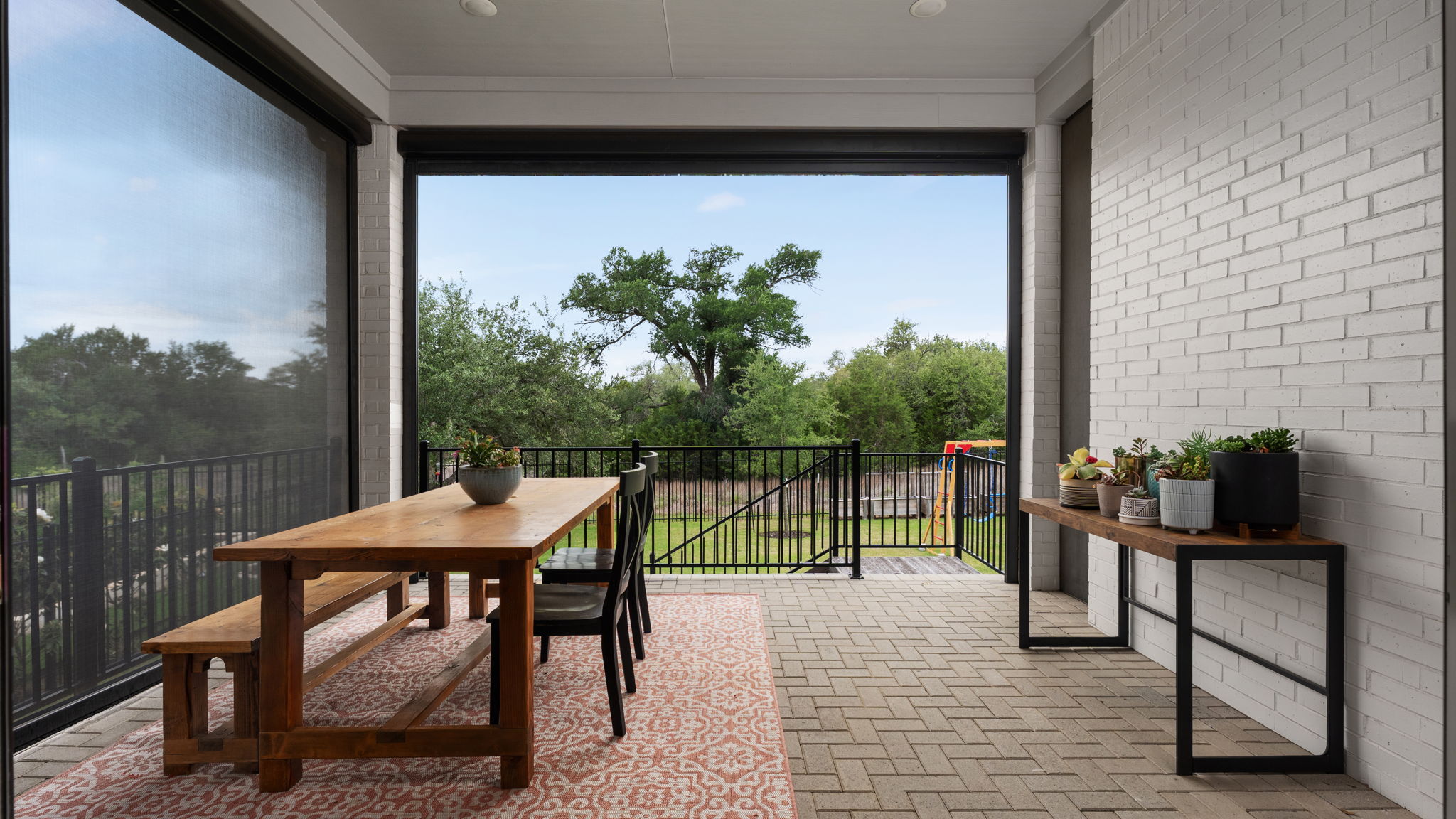 645 Two Creeks Lane Austin, TX 78737 - Photo 23 of 37 a view of a balcony with furniture