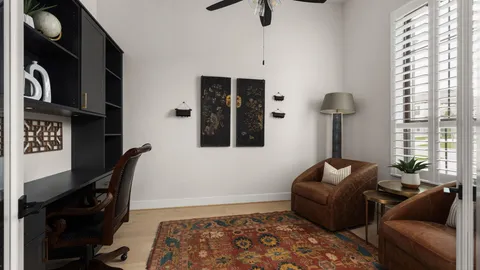 a living room with furniture and a window