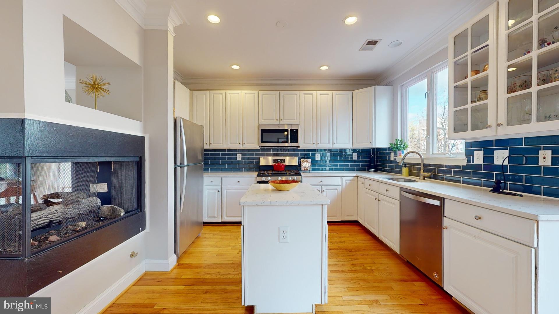 2583 James Madison Circle Herndon, VA 20171 - Photo 5 of 32 Recess lighting provides extra light