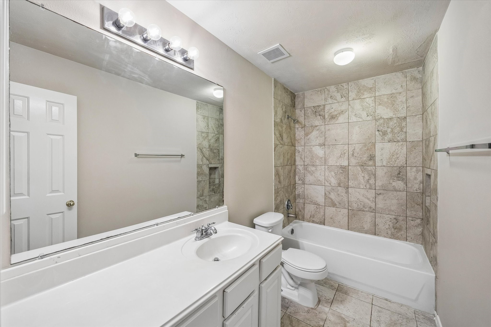 10307 Turrett Point Lane Houston, TX 77064 - Photo 11 of 12 a bathroom with a sink a toilet and shower