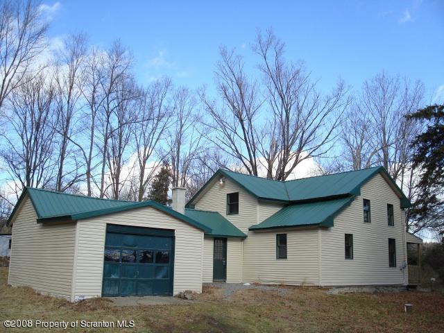 West Nicholson Road Tunkhannock, PA 18657 - Photo 2 of 6 a front view of a house with a yard