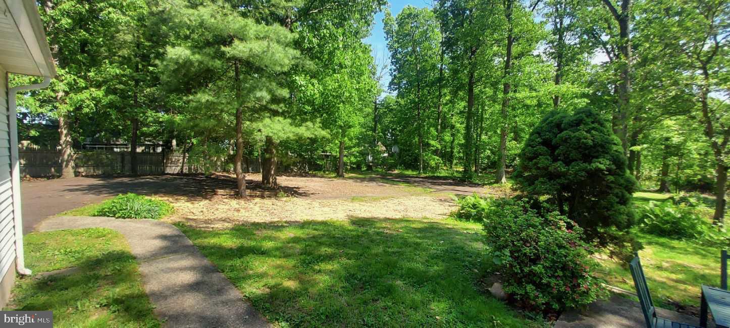 504 Swartley Road Hatfield, PA 19440 - Photo 19 of 32 a view of outdoor space with deck and yard