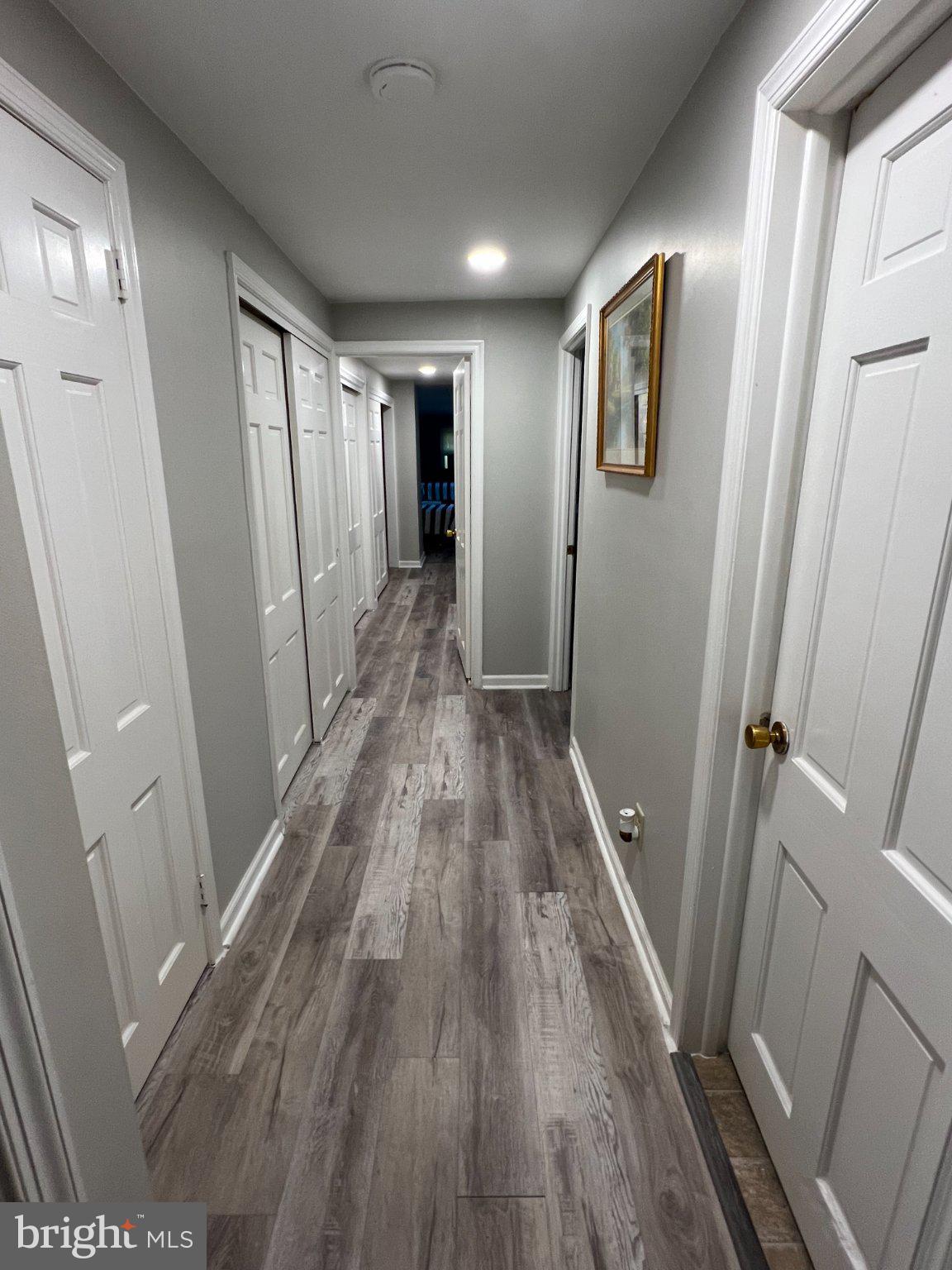 504 Swartley Road Hatfield, PA 19440 - Photo 32 of 32 a view of a hallway with wooden floor and staircase