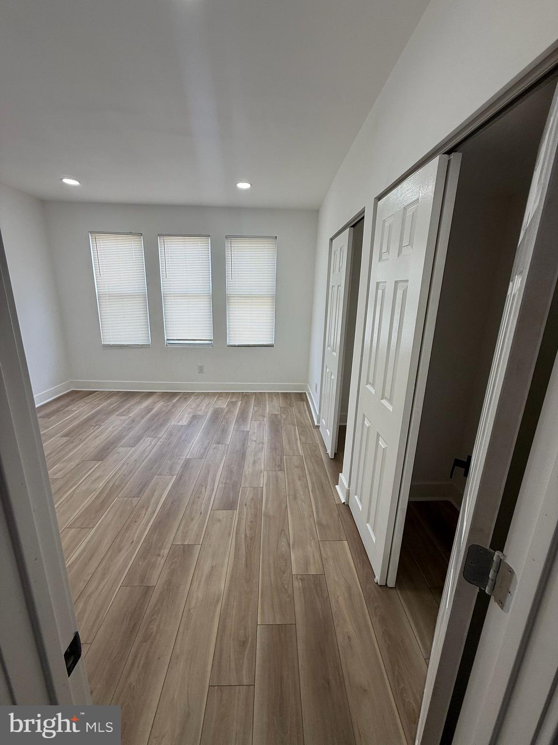 894 Sanger Street Philadelphia, PA 19124 - Photo 21 of 35 a view of a room with wooden floor and staircase