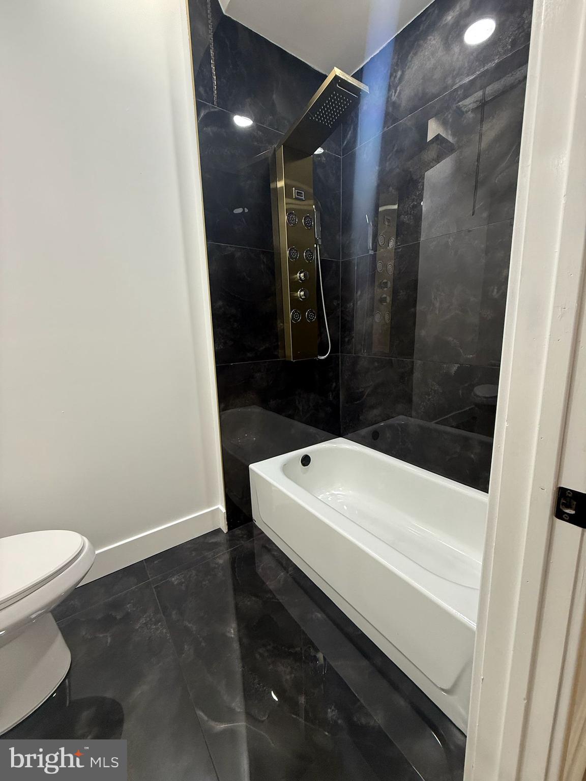 894 Sanger Street Philadelphia, PA 19124 - Photo 22 of 35 a bathroom with a sink and a toilet