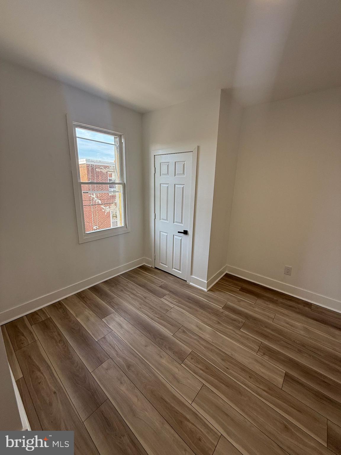 894 Sanger Street Philadelphia, PA 19124 - Photo 25 of 35 a view of an empty room and window
