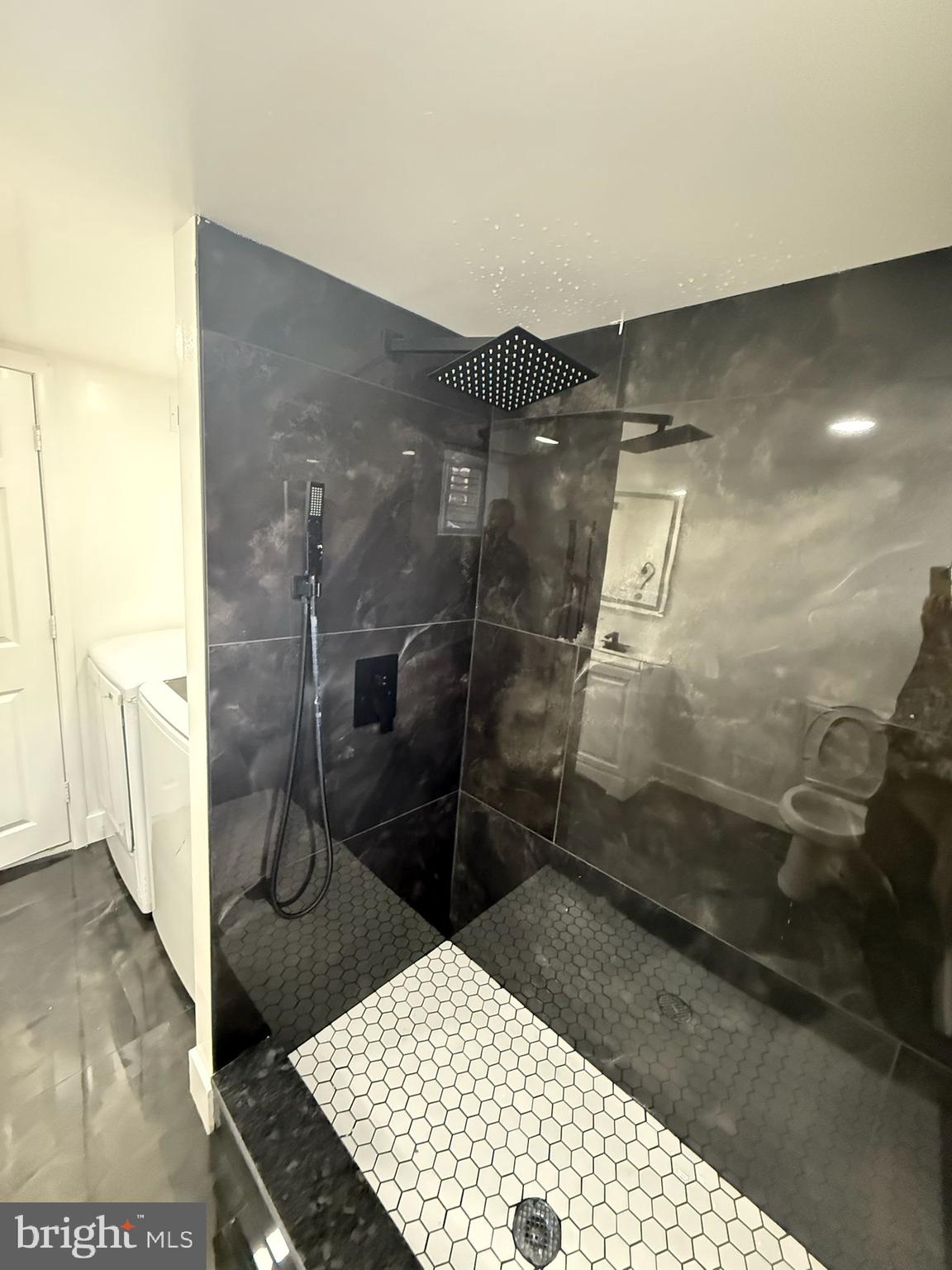 894 Sanger Street Philadelphia, PA 19124 - Photo 30 of 35 a bathroom with a sink and a shower
