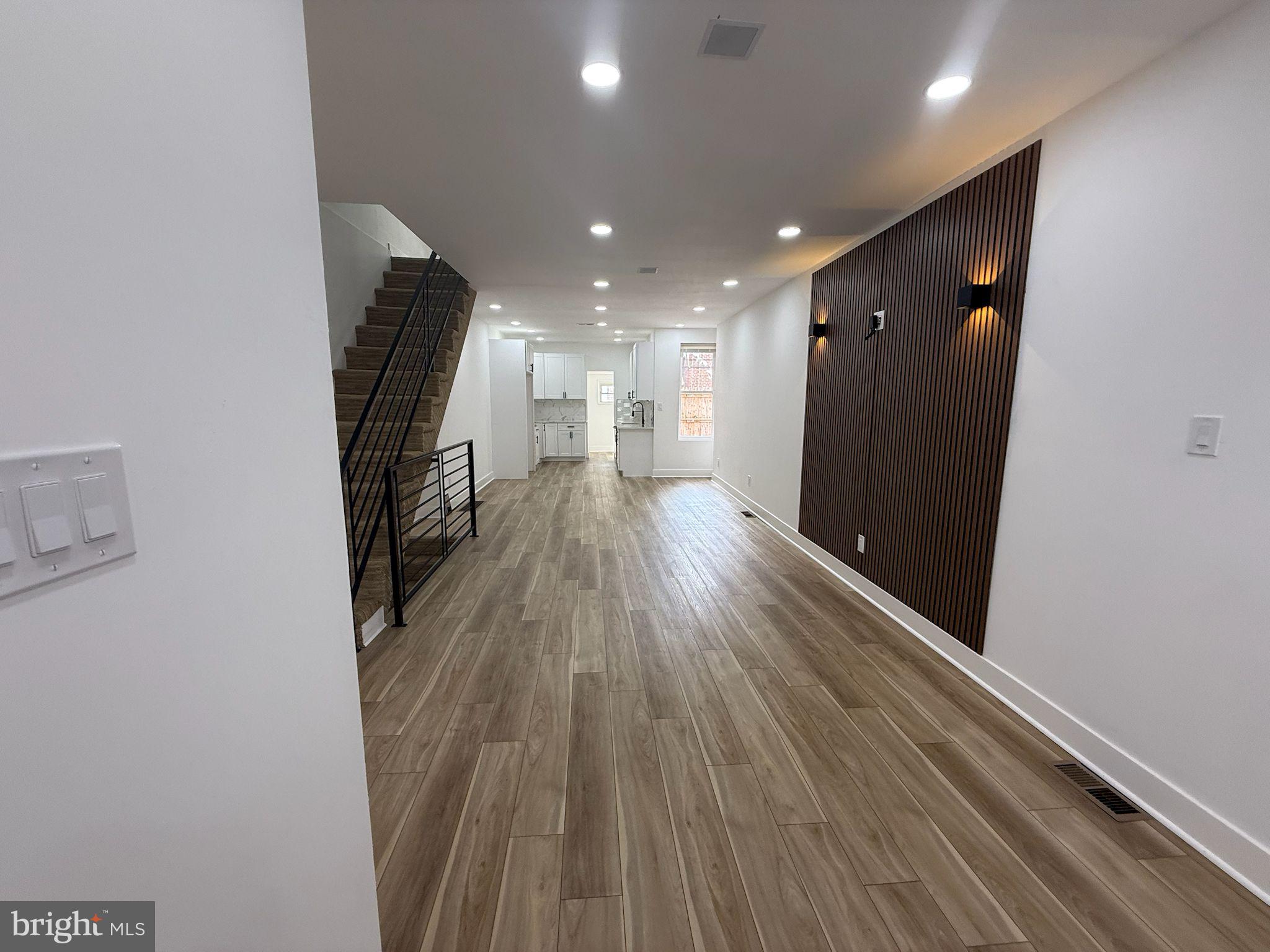 894 Sanger Street Philadelphia, PA 19124 - Photo 8 of 35 a view of gallery with wooden floor