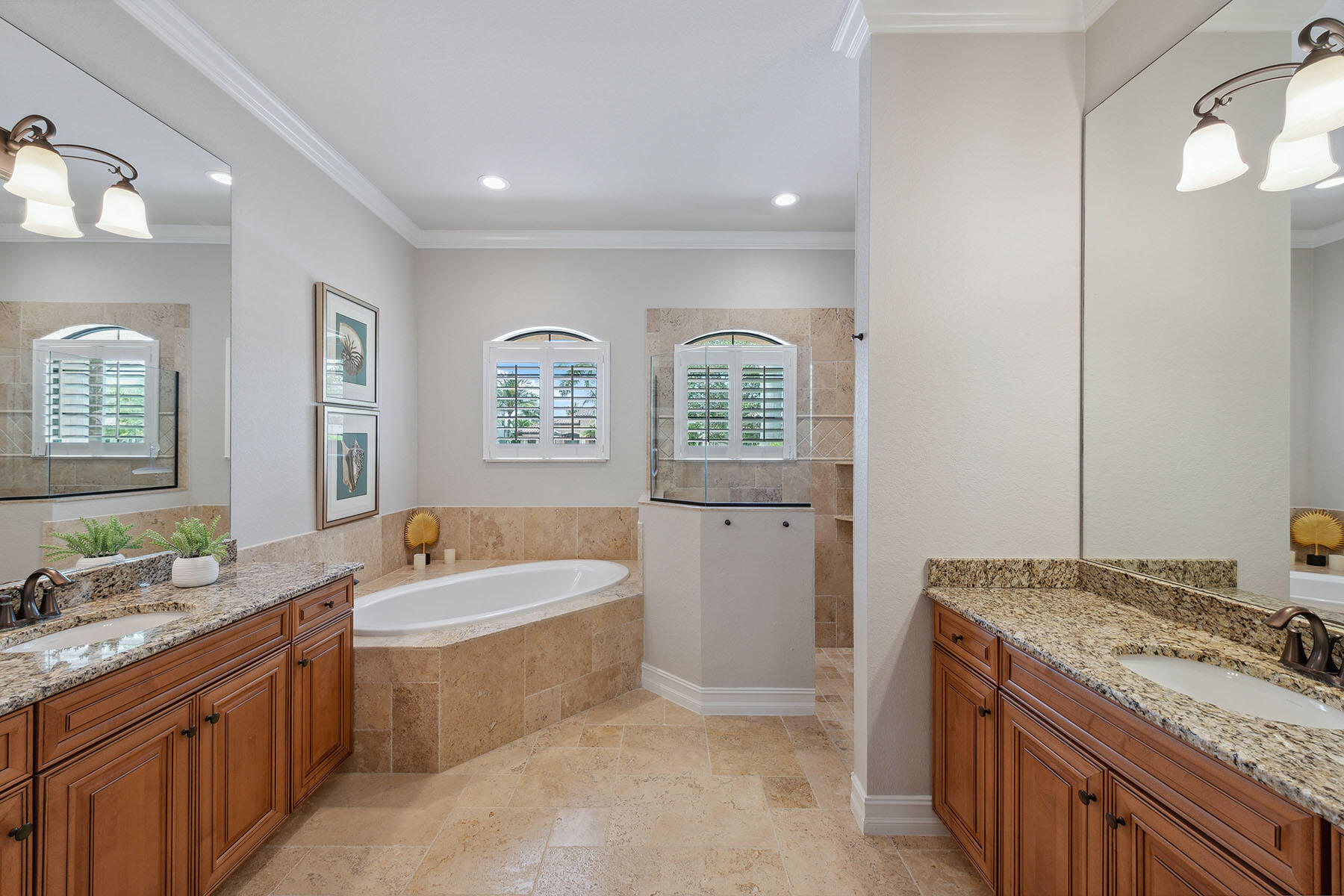 3441 Runaway Lane Naples, FL 34114 - Photo 14 of 50 a bathroom with a granite countertop tub sink and mirror
