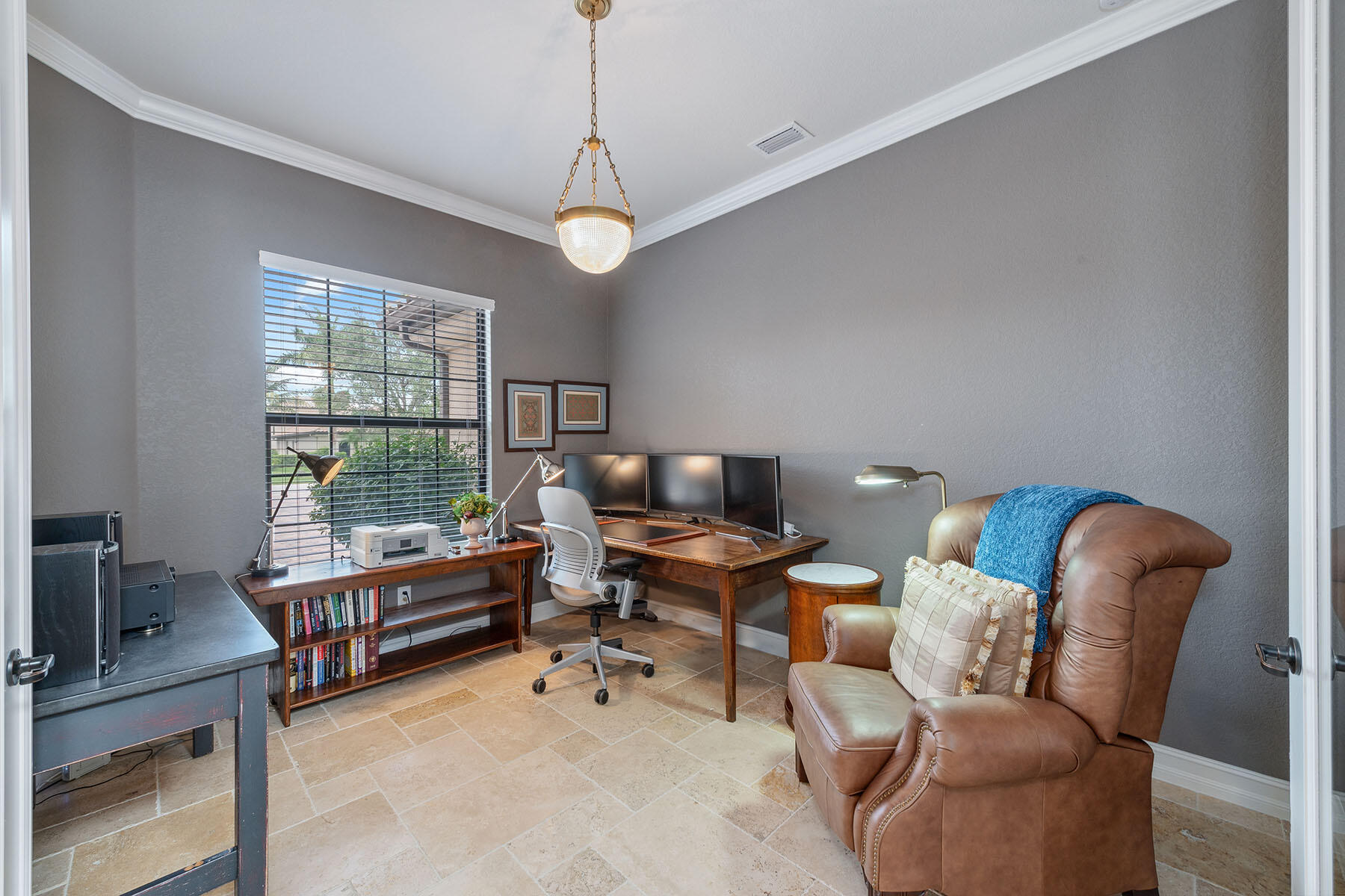 3441 Runaway Lane Naples, FL 34114 - Photo 17 of 50 a workspace with furniture