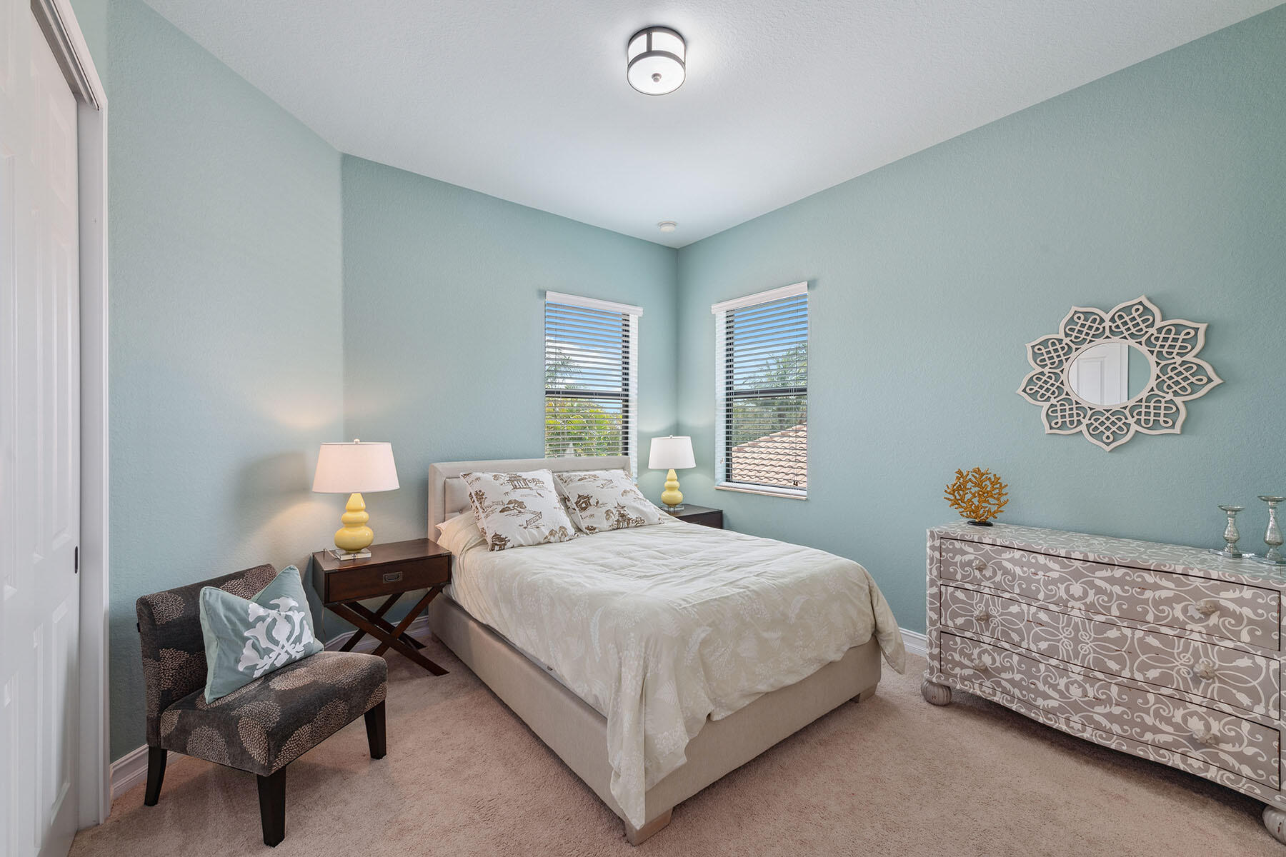 3441 Runaway Lane Naples, FL 34114 - Photo 21 of 50 a bedroom with a bed and a lamp