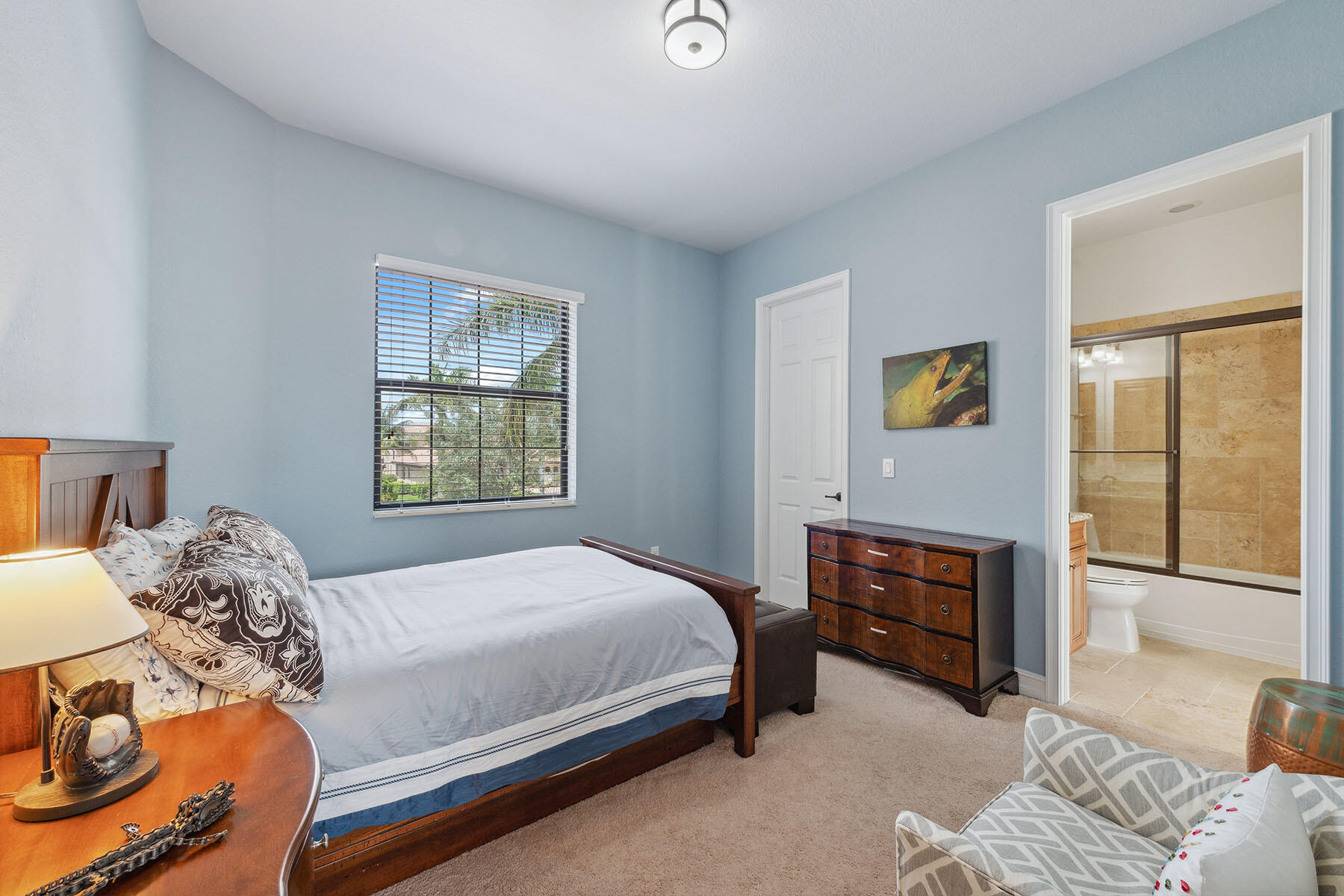 3441 Runaway Lane Naples, FL 34114 - Photo 22 of 50 a bedroom with a bed and wooden floor