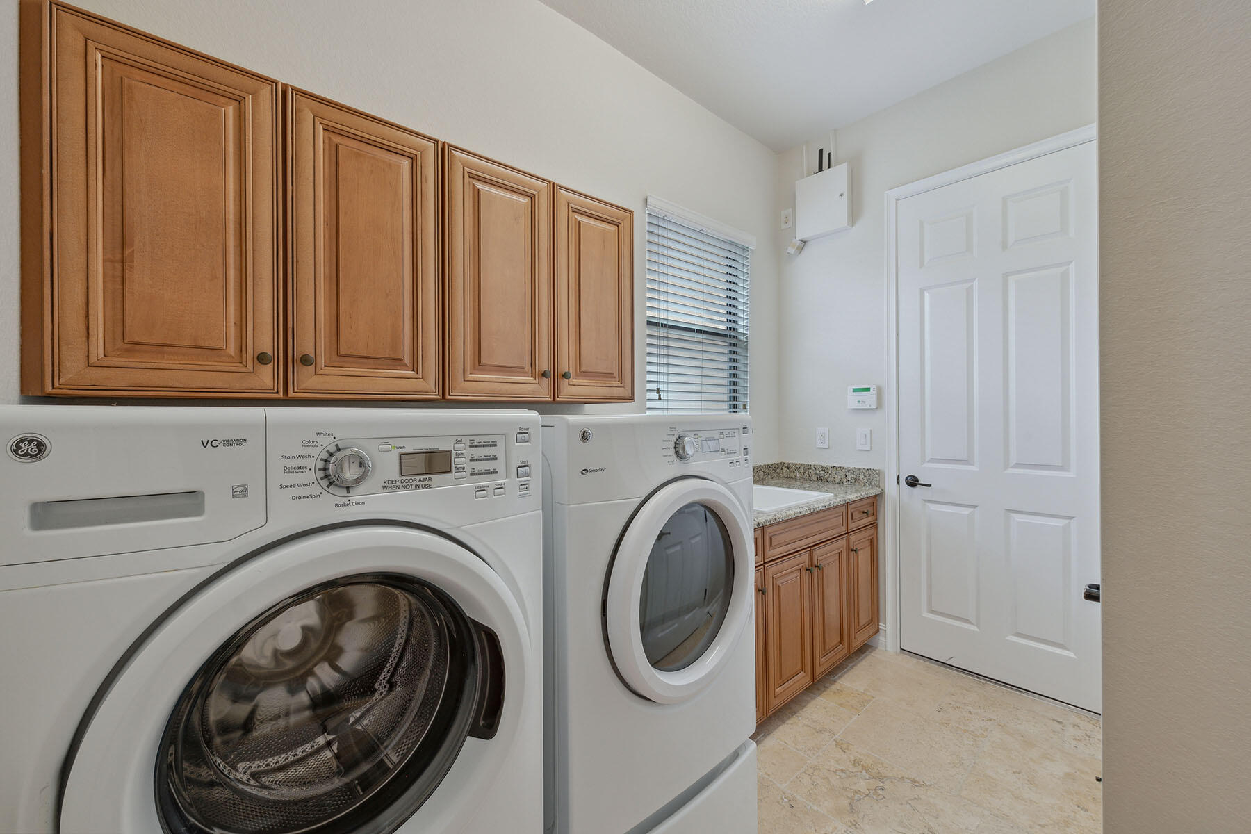 3441 Runaway Lane Naples, FL 34114 - Photo 29 of 50 a utility room with dryer and washer