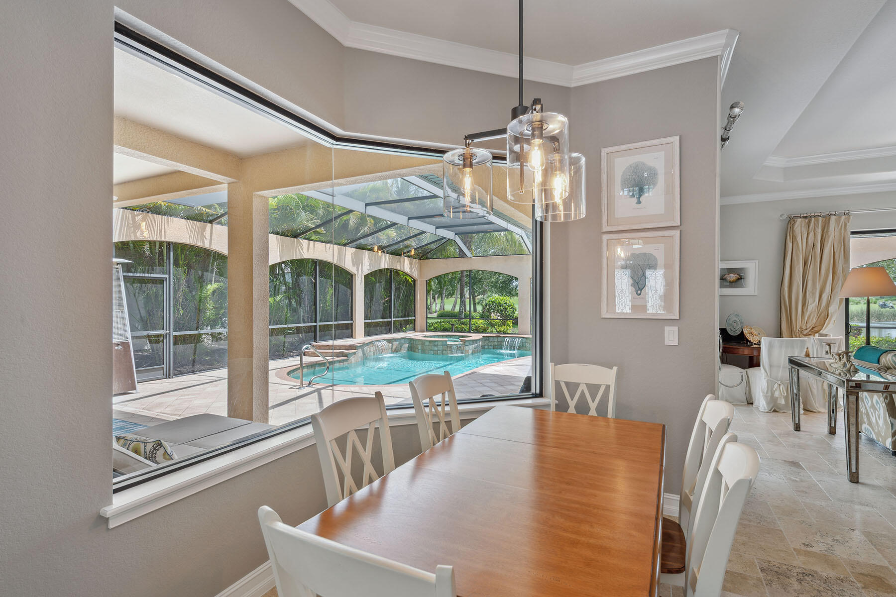 3441 Runaway Lane Naples, FL 34114 - Photo 10 of 50 a view of a dining room with furniture large windows and wooden floor
