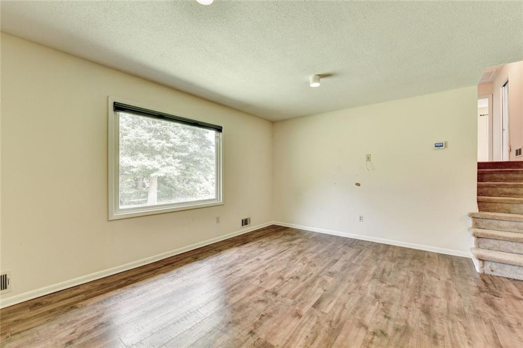 1577 Harbour Oaks Road Tucker, GA 30084 - Photo 11 of 58 a view of an empty room and window