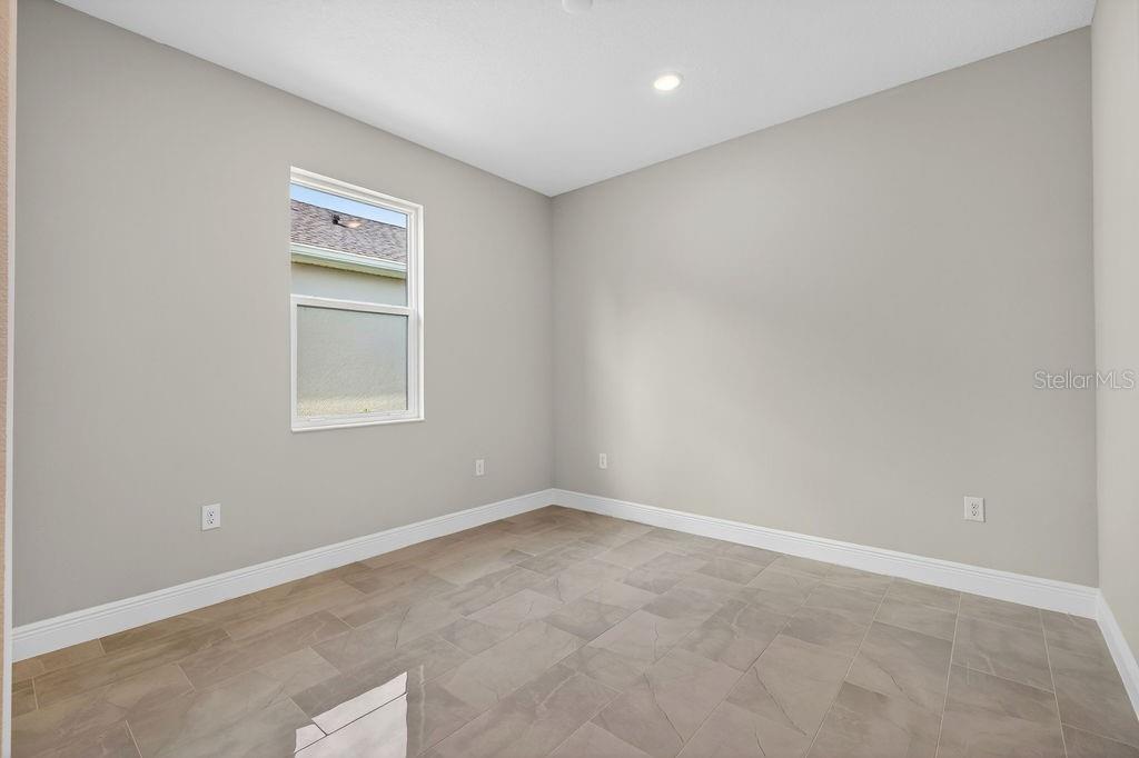 2046 Wallingford Loop Mount Mount Dora, FL 32757 - Photo 23 of 55 an empty room with windows