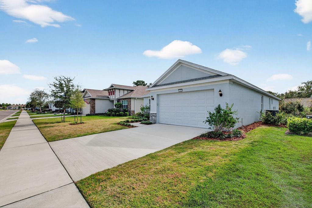 2046 Wallingford Loop Mount Mount Dora, FL 32757 - Photo 3 of 55 a view of outdoor space yard and swimming pool