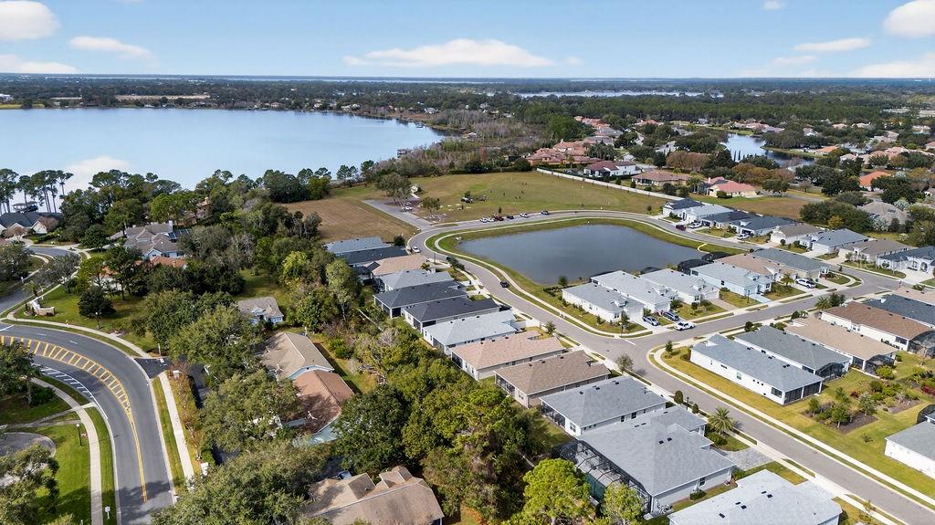 2046 Wallingford Loop Mount Mount Dora, FL 32757 - Photo 42 of 55 an aerial view of a city and lake view
