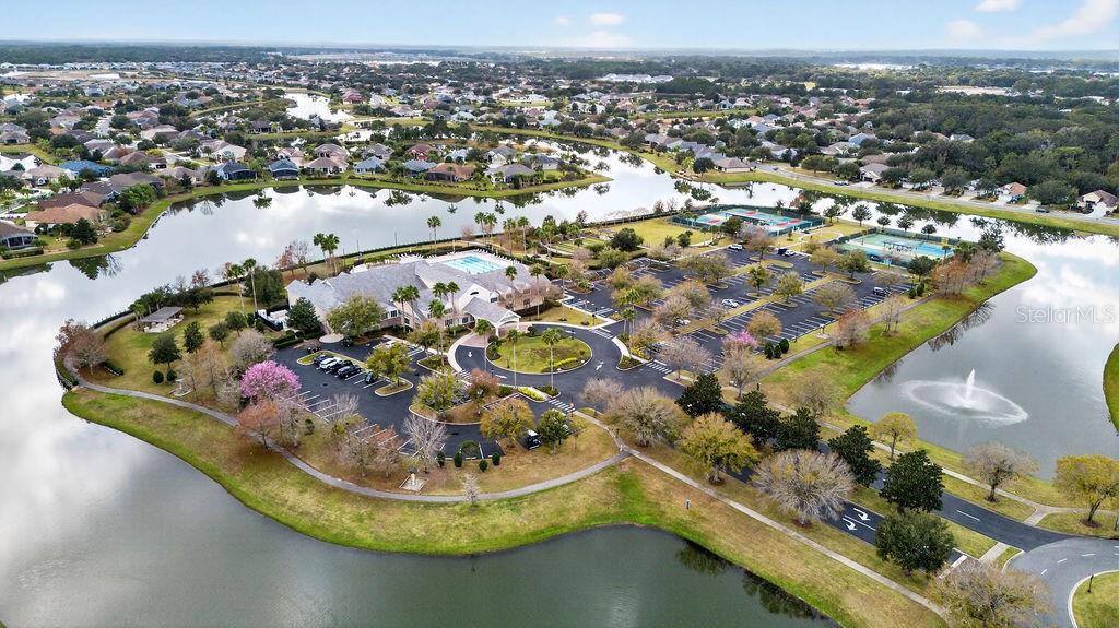 2046 Wallingford Loop Mount Mount Dora, FL 32757 - Photo 48 of 55 an aerial view of a house with a lake view