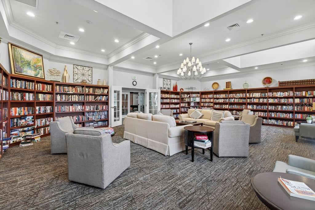 2046 Wallingford Loop Mount Mount Dora, FL 32757 - Photo 50 of 55 a living room with furniture and a chandelier