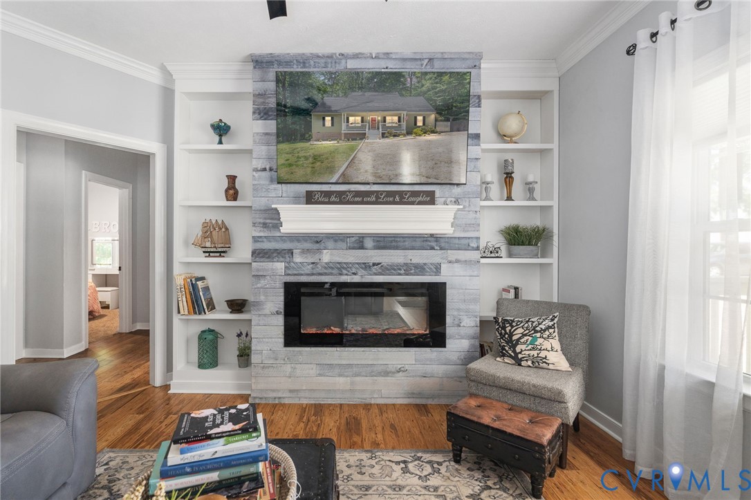 1755 Dispatch Road Quinton, VA 23141 - Photo 18 of 86 a living room with furniture and a fireplace