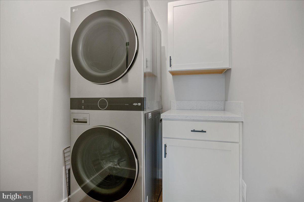 206 Point Lane Solomons, MD 20688 - Photo 27 of 46 a utility room with dryer and washer