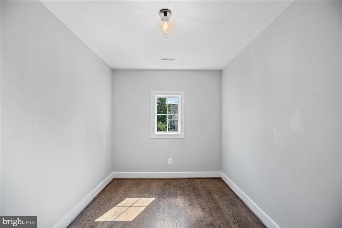 206 Point Lane Solomons, MD 20688 - Photo 33 of 46 an empty room with a window