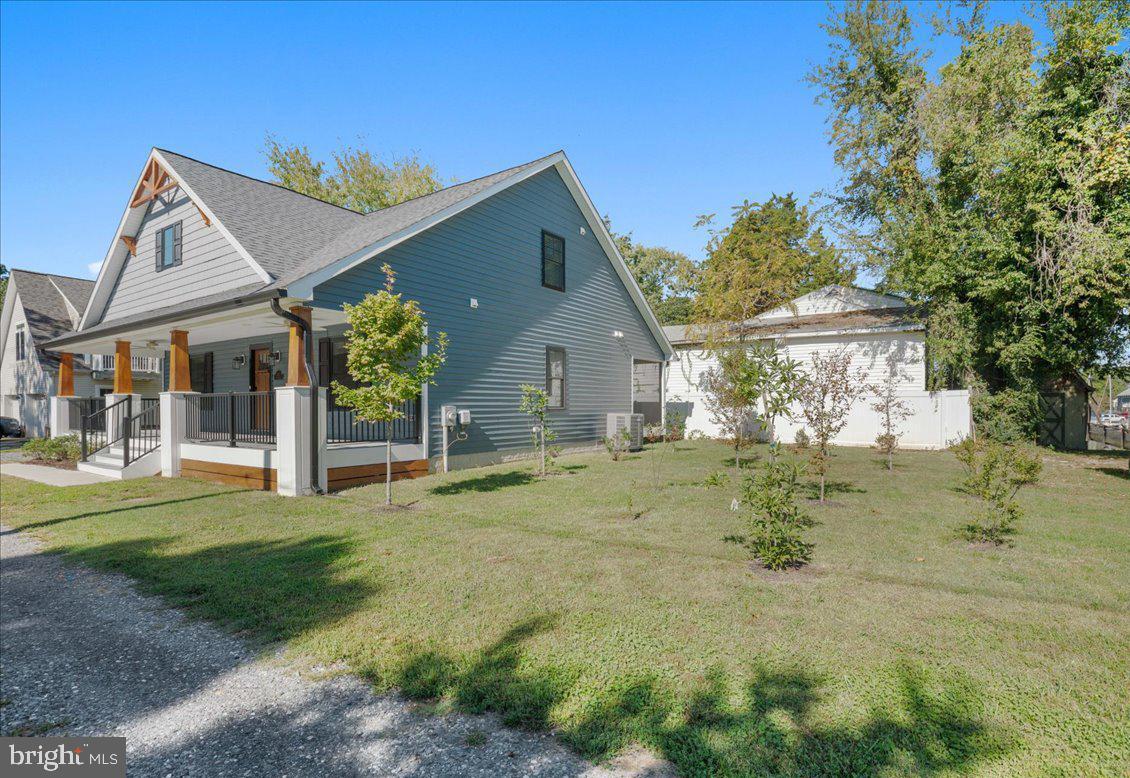 206 Point Lane Solomons, MD 20688 - Photo 38 of 46 a view of a house with a yard