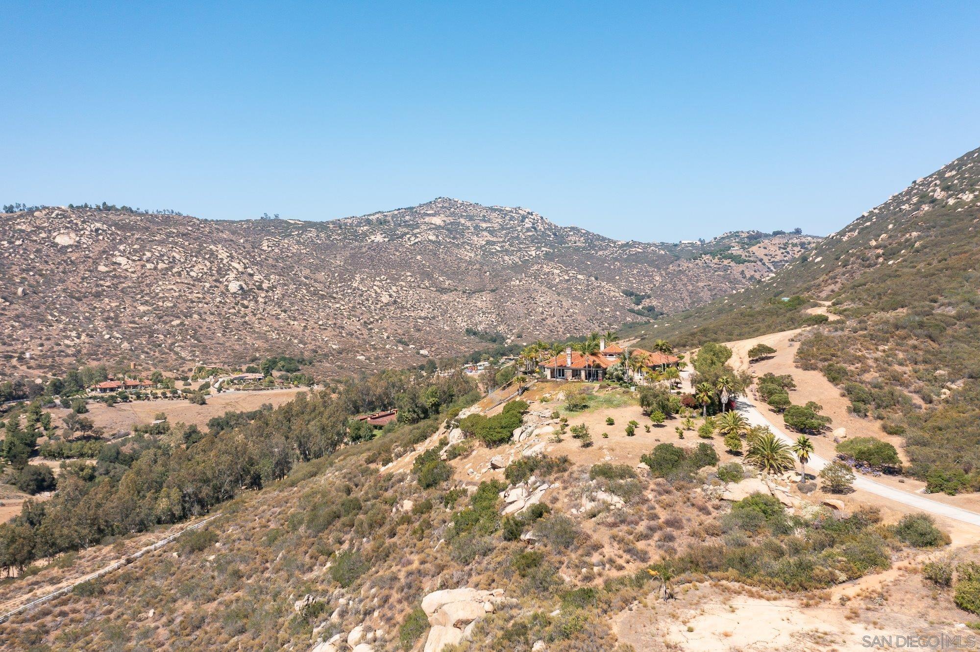 14860 Sunset Ridge Court Poway, CA 92064 - Photo 15 of 27 view of a mountain range in a cloudy sky