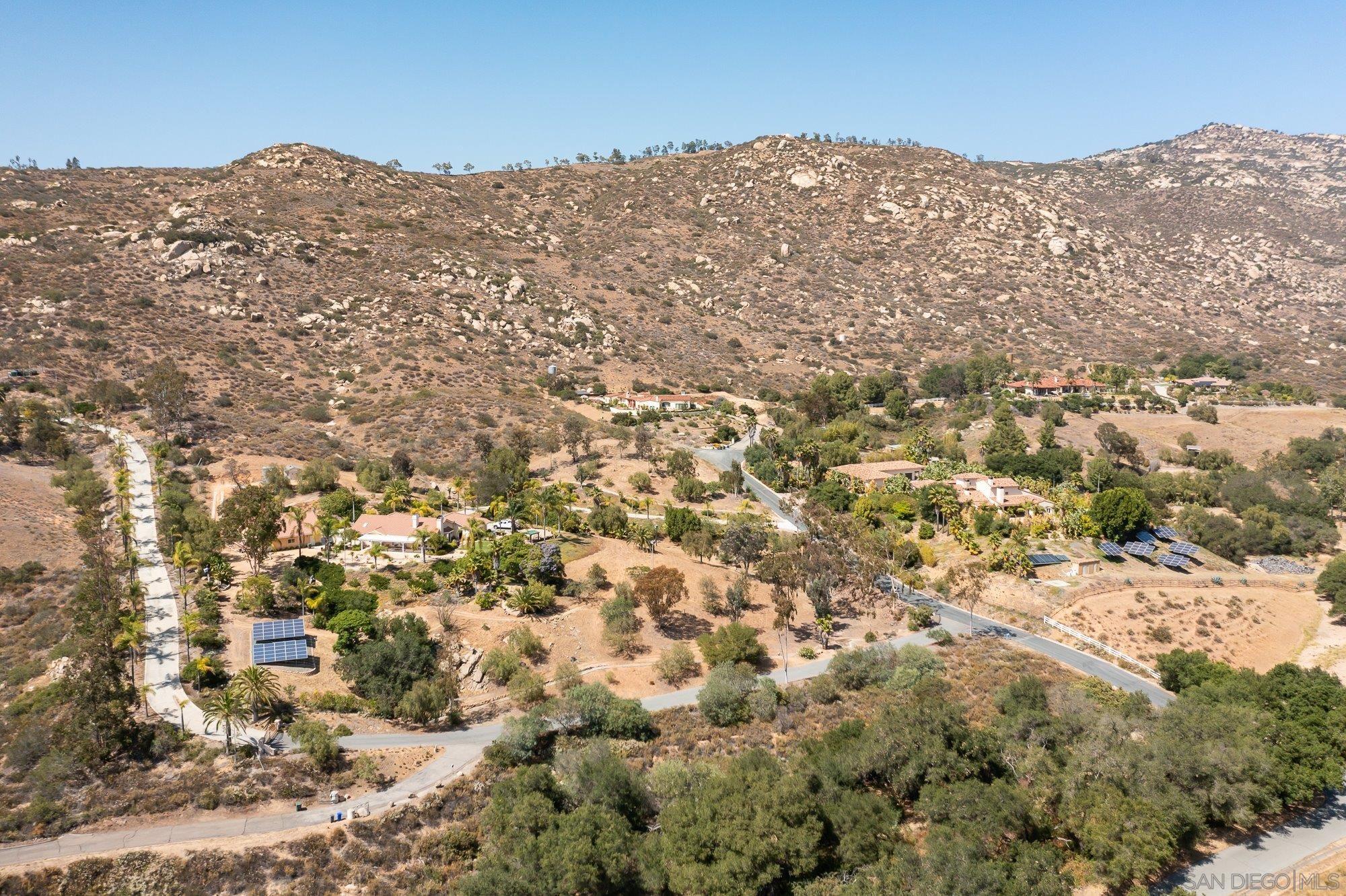 14860 Sunset Ridge Court Poway, CA 92064 - Photo 16 of 27 an aerial view of houses with yard